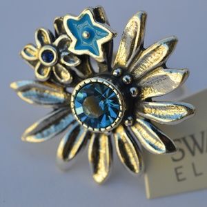 Silver ring with blue Swarovski stones.